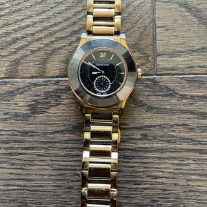 Swarovski womens gold watch